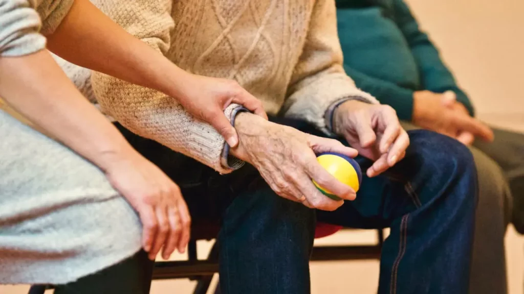 Contact-Person Holding a Stress Ball