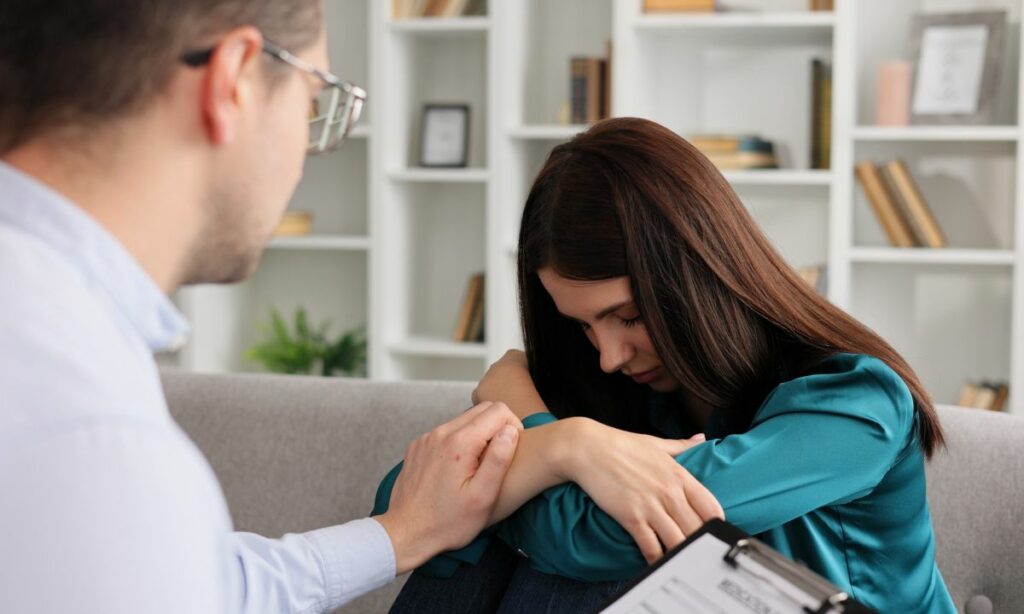 Male psychiatrist with female patient